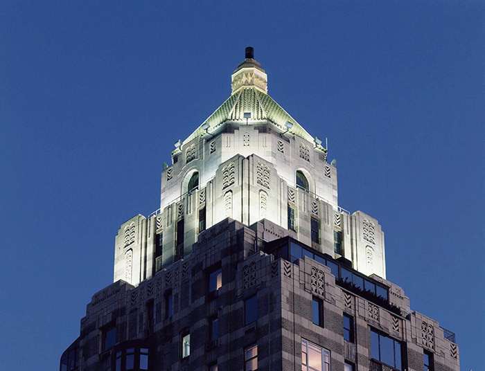 The iconic Art Deco silhouette <p>of the Carlyle Hotel NYC<p>
tower at nightfall<p>.